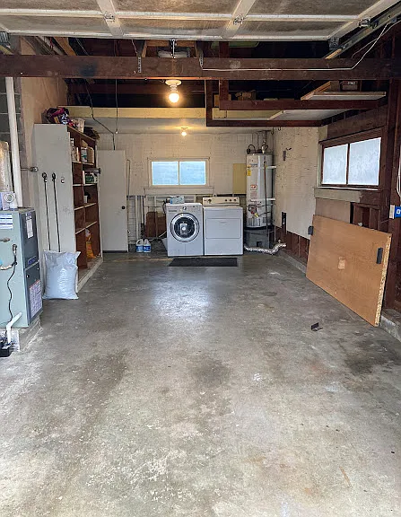 Garage. Please note, washer was recently replaced with a top loader.