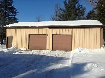 30x50 pole building w new roof, electric and garage door openers