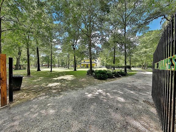 2 acres of unrestricted property behind private gate.