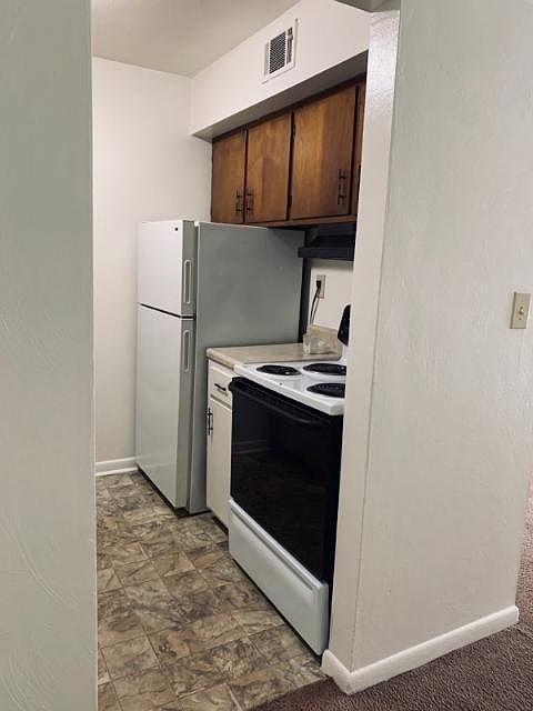 Other side of galley kitchen.