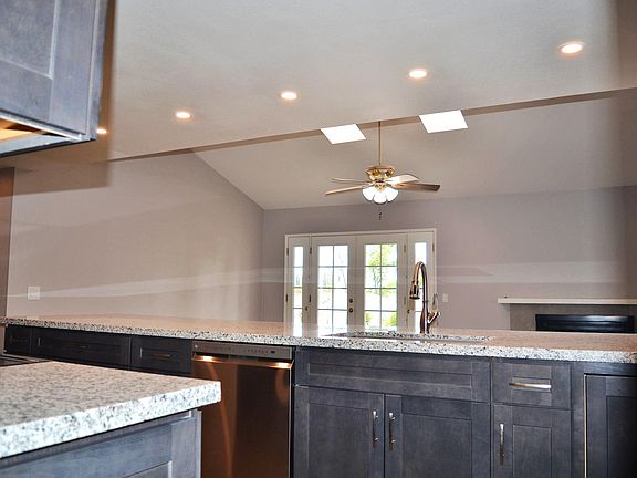 Kitchen looking out to family room 
French doors leading to outdoor patio area and backyard