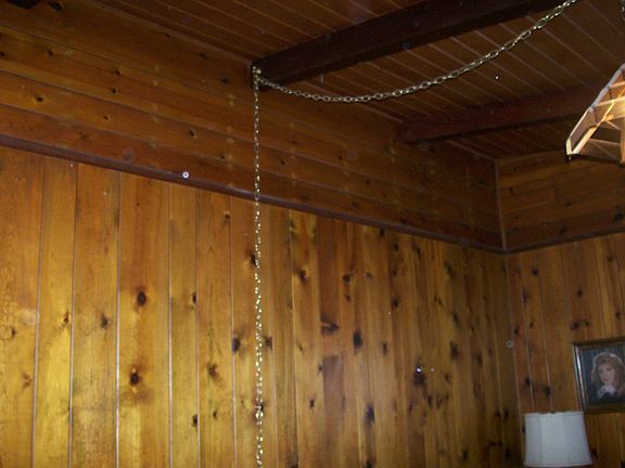 Wood paneling bedroom