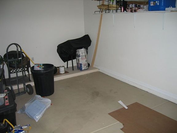 One-car garage downstairs. Lots of storage under the stairs, too.