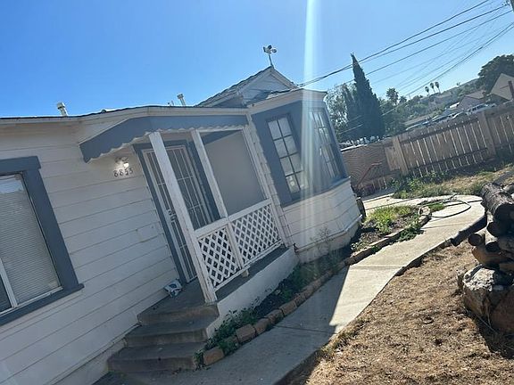 6 ft fenced front yard.