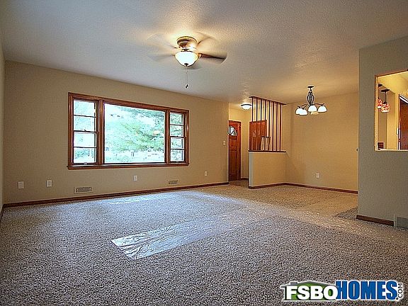 Spacious Front Living Room with New Carpet