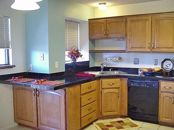 GOURMET KITCHEN WITH ADJOINING DINING AREA
