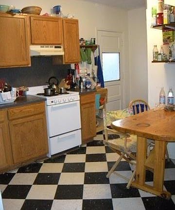 Kitchen w/built in table and access to rear yard