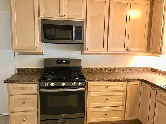 Newly remodelled kitchen. New microwave, oven/stove and dishwasher.