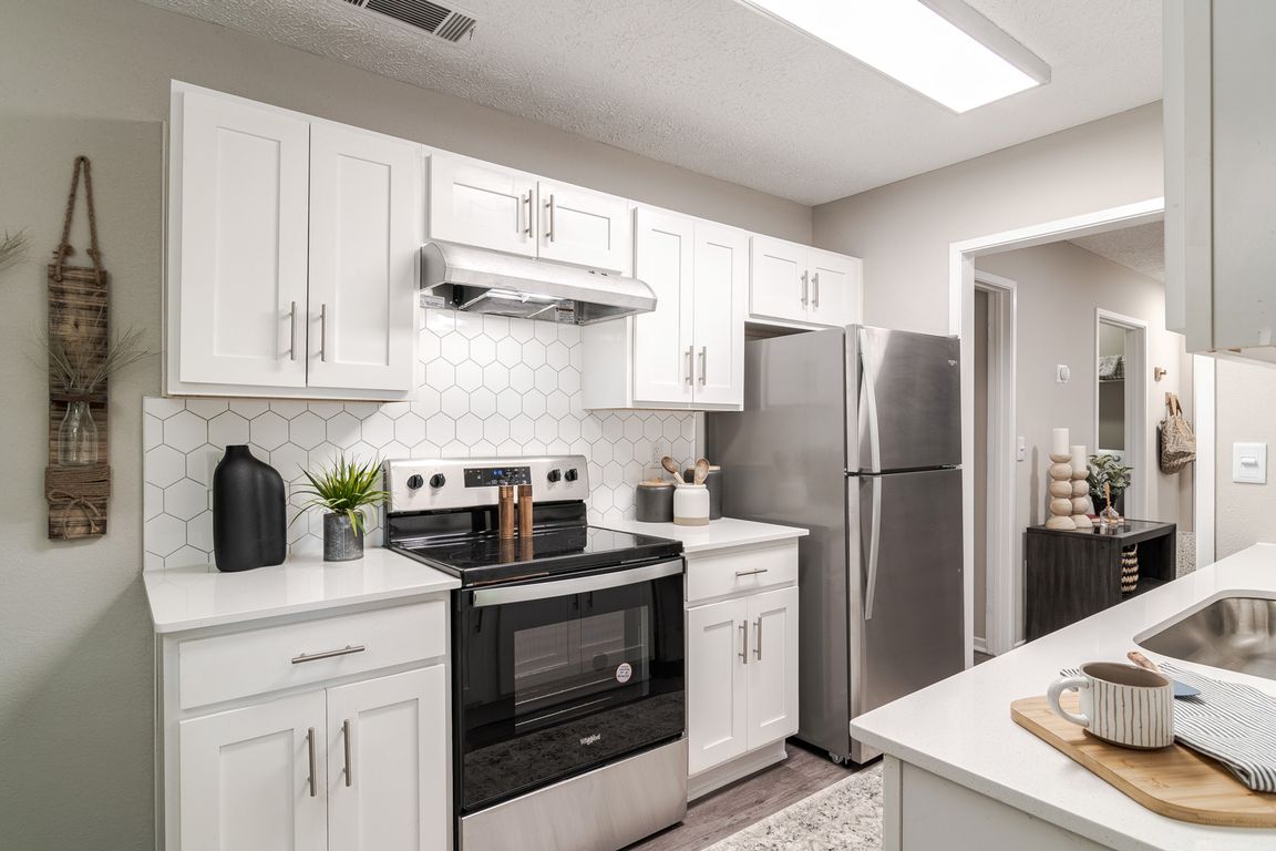 Newly Renovated Kitchen with Stainless Steel Appliaces