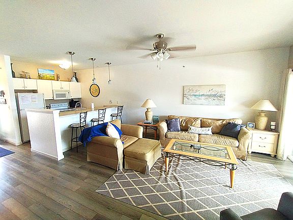 Living rroom and kitchen with breakfast bar.