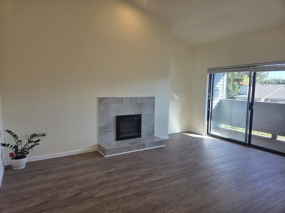 Living Room with Balcony - Luxury Vinyl Plank (LVP) Flooring