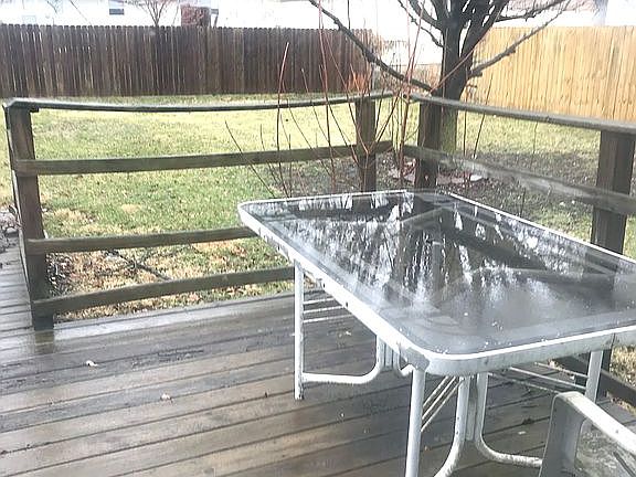 Back yard fenced two sides. 