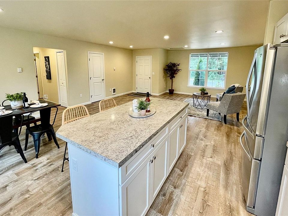 View of dining and great room from kitchen.