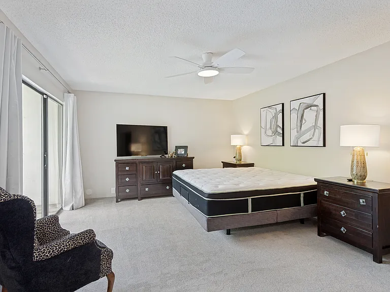Spacious primary suite with balcony