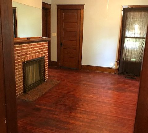 Living room looking towards the front of the house from the dining room.