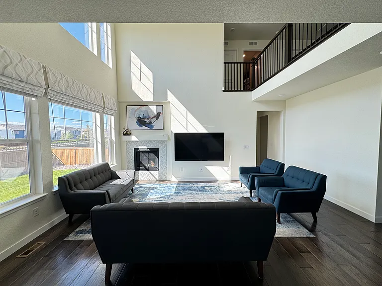 Living Area/Family Room with vaulted ceilings