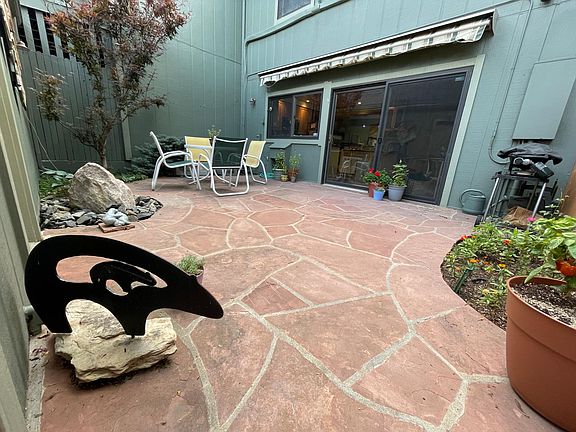 Find your ZEN in the private back patio. Flower garden, water feature, and grill.