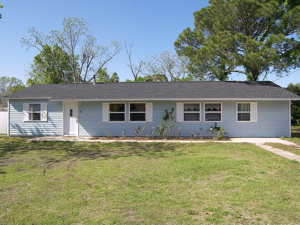Easy care 1-story ranch on large fenced lot!