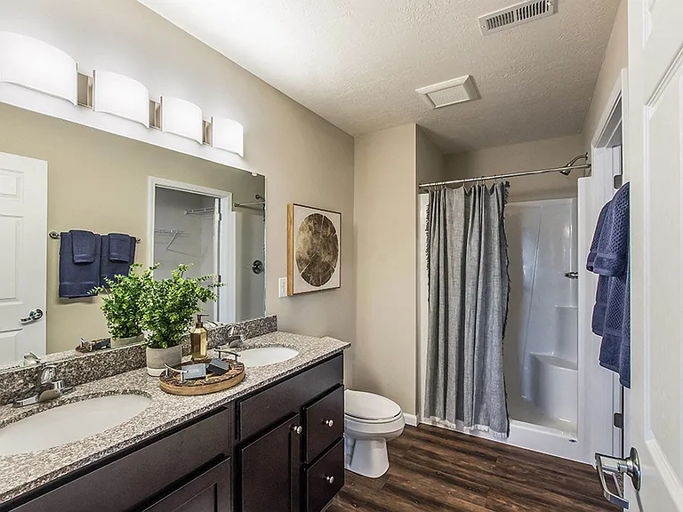 Two Beautiful Bathrooms with Lots of Storage