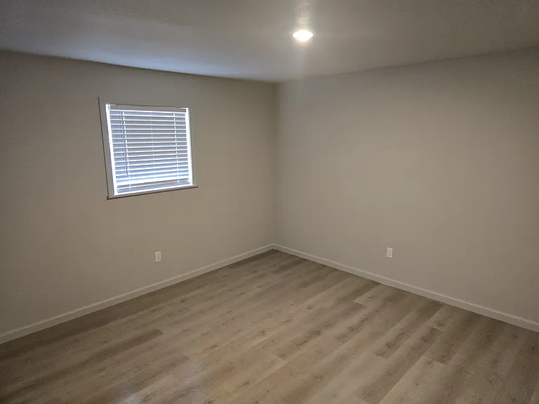 Bedrooms have new flooring, windows, lighting, trim and paint