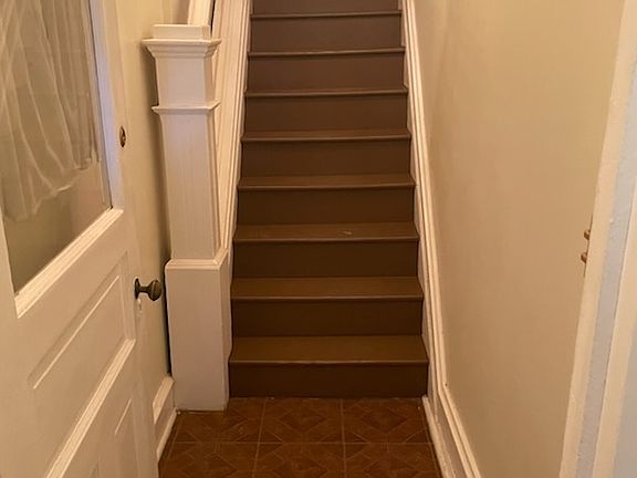 Front entrance stairwell going up to Unit 2