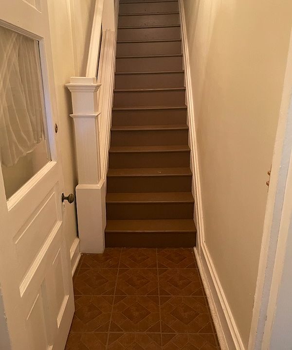 Front entrance stairwell going up to Unit 2