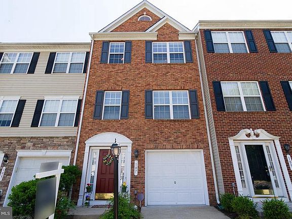 Beautiful Brick Front  Colonial with Garage