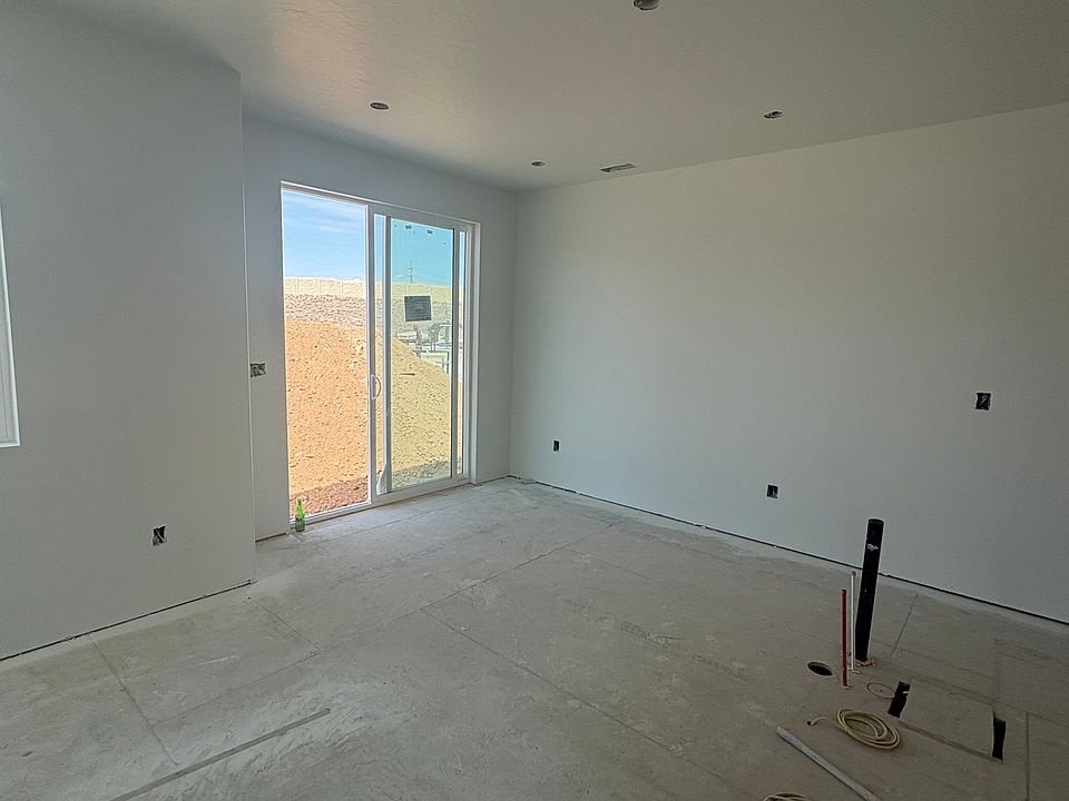 Sliding glass back door located off of kitchen/living room area on main floor.