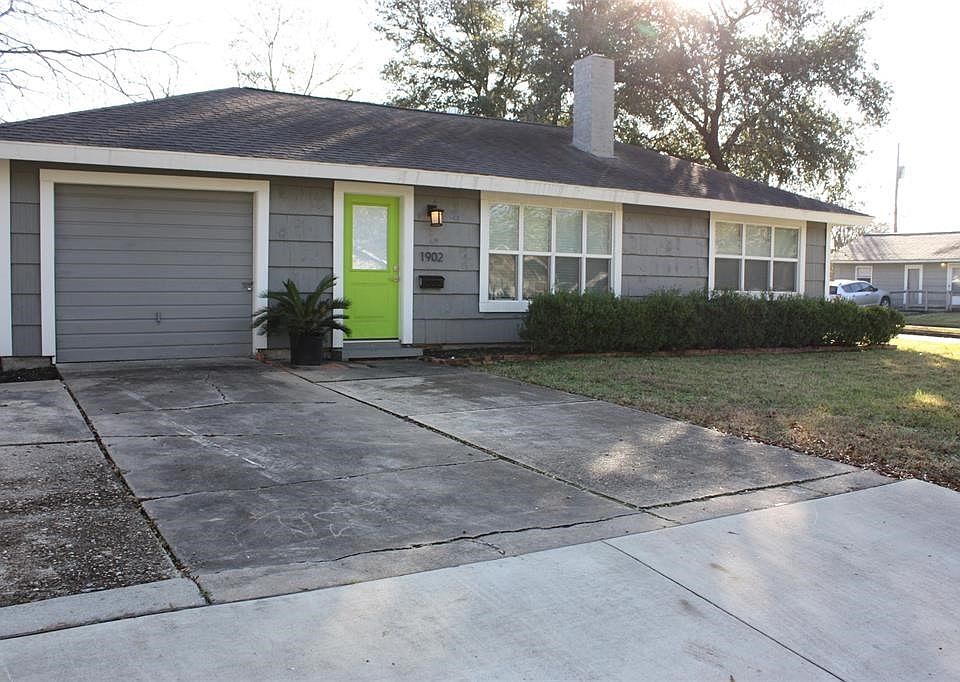 Front of home on corner lot has been updated and has an attached single garage.