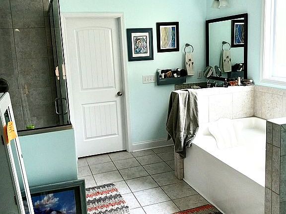 Downstairs master bathroom, sinks-either-side-of-tub