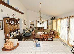 Open dining, kitchen, living