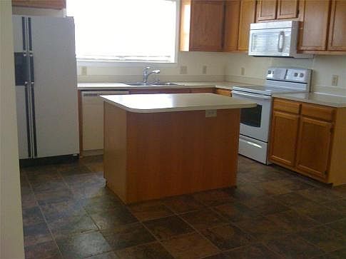Large eat-in kitchen with new tile
