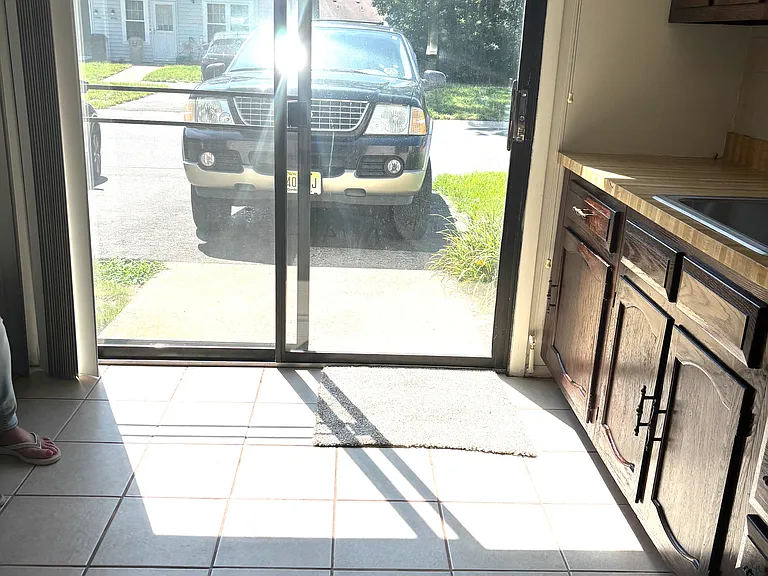 patio off kitchen with parking in back.