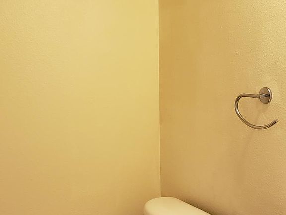 Half a toilet down stairs