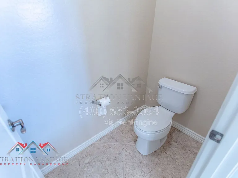 11751 W Daley Ln — Photo 36