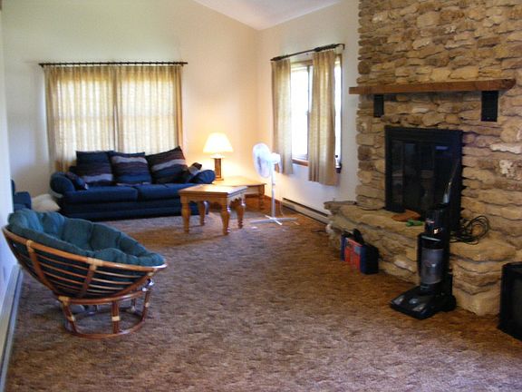 Living Room with Beautiful Stone Fireplace