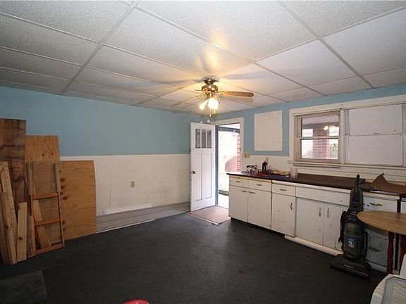 "2nd" Kitchen is 15x13. Could finish to make a true Duplex! Hall off Left has a Shelved Closet and leads to the Full Bath and 10