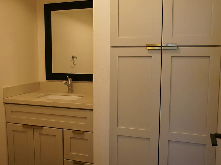 Storage Closet in Powder Room