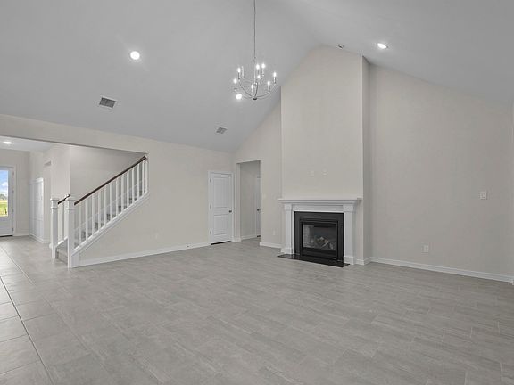 Great room with chandelier fireplace