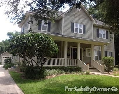 Lovely front porch facing brick street