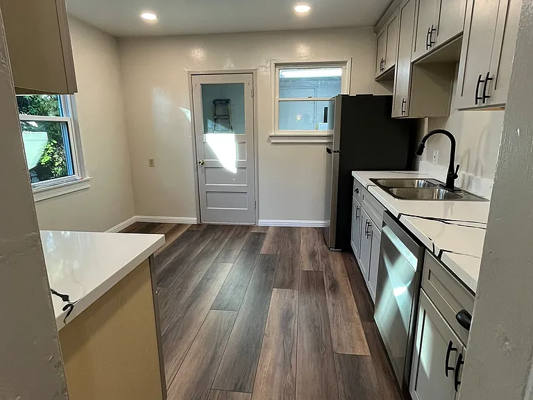 There's plenty of space to cook and a space for a kitchen table.
