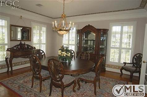 Formal Dining Room. Wood Floors look great.