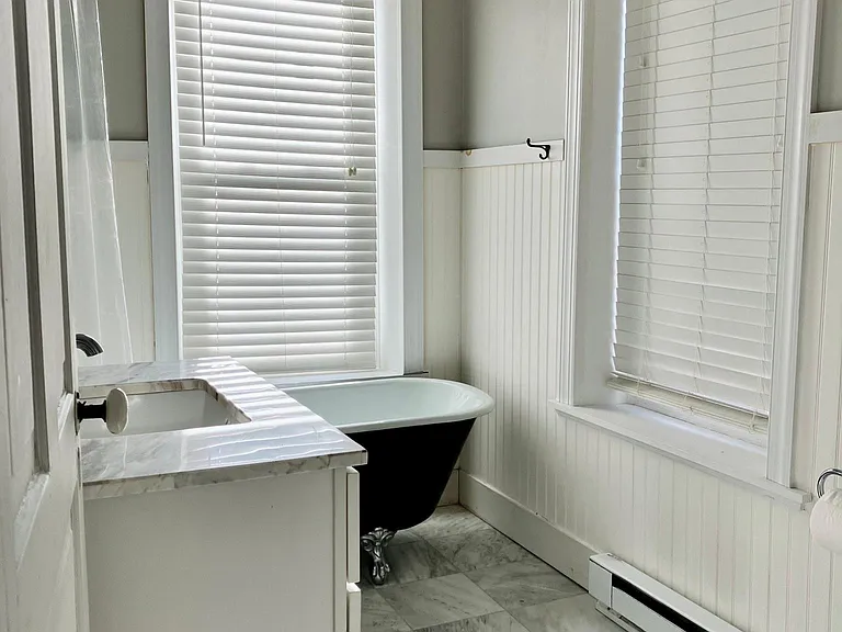 Bathroom with original clawfoot tub & marble floors