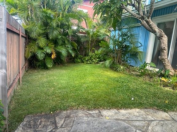 Private front yard. Lots of greenery.