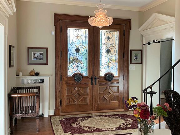 grand foyer with view of front doors