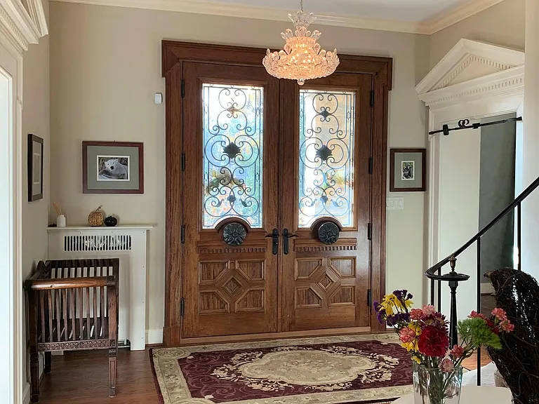 Grand foyer with view of front doors