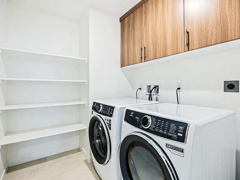Full laundry room so you can pack light and wash as you go.