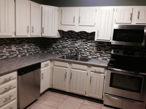 Kitchen with granite and stainless appliances