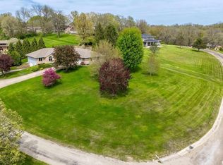 1 E Timberline Ct, Blue Grass, IA 52726