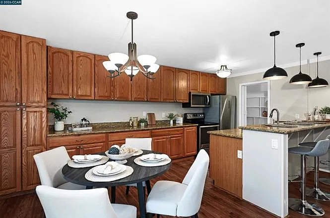 Building Photo - 9085 Alcosta Blvd #356